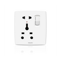 A white Philips wall outlet with a single-pole switch, photographed on a clean white background with a subtle reflection below.Supplied by Chinoy Electric