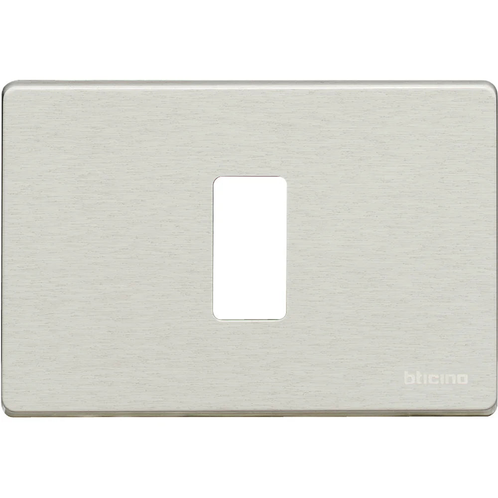 A brushed nickel single-toggle light switch plate with a rectangular cutout in the center and the 'bticino' brand logo in the bottom right corner, shown against a plain white background.