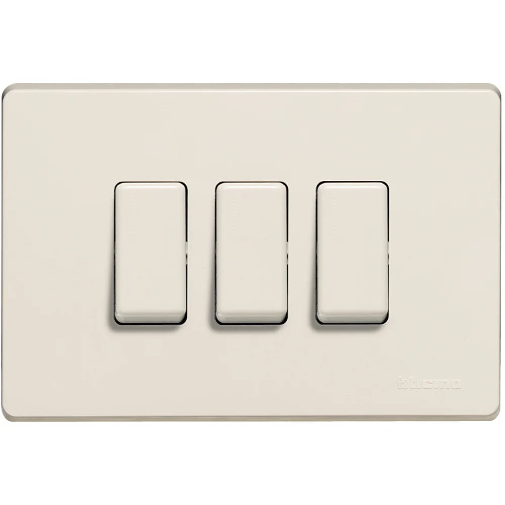 A three-light switch plate in a warm cream or off-white finish, featuring three rectangular toggle switches with black outlines. The brand name 'BICHO' is subtly embossed in the bottom right corner of the plate.