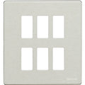 A brushed nickel six-guillote wall plate by bticino, featuring six rectangular cutouts arranged in two rows of three.