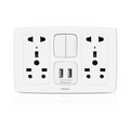 A white Philips wall power strip with two UK three-pin outlets, a central double switch, and a USB-C and USB-A charging port in the center, shown on a white background with a faint reflection below.Supplied by Chinoy Electric