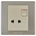 Philips two-pin wall switch outlet in a brushed silver metal finish with a beige central faceplate and a small red switch indicator.Supplied by Chinoy Electric